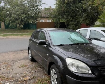 Чорний Кіа Ріо, об'ємом двигуна 1.4 л та пробігом 140 тис. км за 6500 $, фото 4 на Automoto.ua