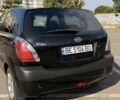 Чорний Кіа Ріо, об'ємом двигуна 1.4 л та пробігом 260 тис. км за 4600 $, фото 3 на Automoto.ua