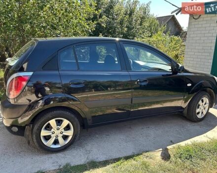 Черный Киа Рио, объемом двигателя 1.4 л и пробегом 214 тыс. км за 5100 $, фото 1 на Automoto.ua
