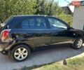 Черный Киа Рио, объемом двигателя 1.4 л и пробегом 214 тыс. км за 5100 $, фото 1 на Automoto.ua