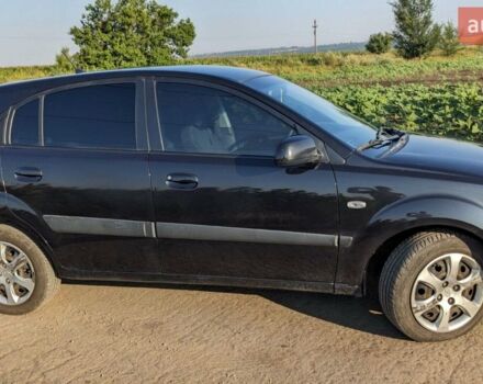 Чорний Кіа Ріо, об'ємом двигуна 1.4 л та пробігом 160 тис. км за 6200 $, фото 4 на Automoto.ua