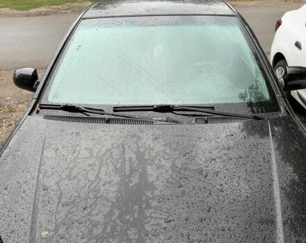Чорний Кіа Ріо, об'ємом двигуна 1.4 л та пробігом 140 тис. км за 6500 $, фото 5 на Automoto.ua