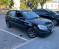 Черный Киа Рио, объемом двигателя 1.4 л и пробегом 208 тыс. км за 3650 $, фото 1 на Automoto.ua