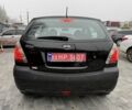 Черный Киа Рио, объемом двигателя 1.4 л и пробегом 166 тыс. км за 5999 $, фото 4 на Automoto.ua