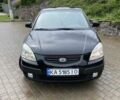 Чорний Кіа Ріо, об'ємом двигуна 1.5 л та пробігом 241 тис. км за 4350 $, фото 4 на Automoto.ua