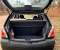 Чорний Кіа Ріо, об'ємом двигуна 1.4 л та пробігом 194 тис. км за 4500 $, фото 2 на Automoto.ua