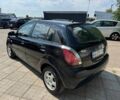 Черный Киа Рио, объемом двигателя 1.4 л и пробегом 160 тыс. км за 5993 $, фото 2 на Automoto.ua