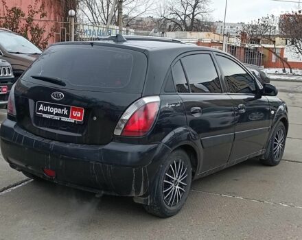 Черный Киа Рио, объемом двигателя 1.4 л и пробегом 274 тыс. км за 5290 $, фото 8 на Automoto.ua