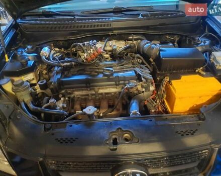 Чорний Кіа Ріо, об'ємом двигуна 1.4 л та пробігом 390 тис. км за 3500 $, фото 3 на Automoto.ua