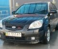 Черный Киа Рио, объемом двигателя 1.4 л и пробегом 349 тыс. км за 2599 $, фото 1 на Automoto.ua
