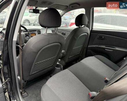 Черный Киа Рио, объемом двигателя 1.4 л и пробегом 166 тыс. км за 6000 $, фото 17 на Automoto.ua