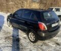 Чорний Кіа Ріо, об'ємом двигуна 1.4 л та пробігом 208 тис. км за 6200 $, фото 3 на Automoto.ua