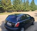Чорний Кіа Ріо, об'ємом двигуна 1.4 л та пробігом 240 тис. км за 3711 $, фото 4 на Automoto.ua