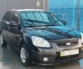 Черный Киа Рио, объемом двигателя 1.4 л и пробегом 349 тыс. км за 2599 $, фото 6 на Automoto.ua