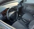 Черный Киа Рио, объемом двигателя 1.4 л и пробегом 230 тыс. км за 3850 $, фото 1 на Automoto.ua