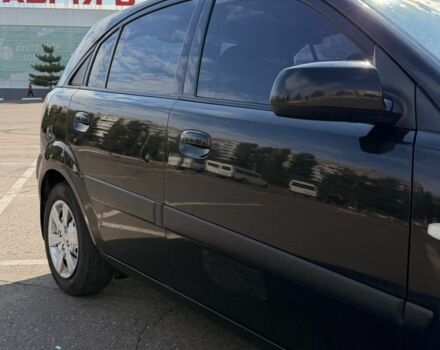 Чорний Кіа Ріо, об'ємом двигуна 1.4 л та пробігом 260 тис. км за 4600 $, фото 1 на Automoto.ua