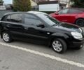 Чорний Кіа Ріо, об'ємом двигуна 1.4 л та пробігом 188 тис. км за 5100 $, фото 2 на Automoto.ua