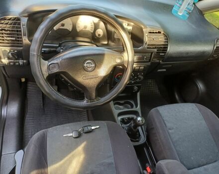 Черный Киа Рио, объемом двигателя 1.4 л и пробегом 204 тыс. км за 3897 $, фото 7 на Automoto.ua