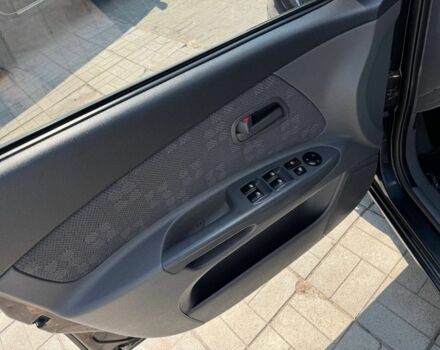 Черный Киа Рио, объемом двигателя 1.4 л и пробегом 160 тыс. км за 5993 $, фото 8 на Automoto.ua