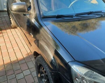 Чорний Кіа Ріо, об'ємом двигуна 1.4 л та пробігом 390 тис. км за 3500 $, фото 5 на Automoto.ua
