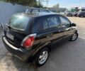 Чорний Кіа Ріо, об'ємом двигуна 1.4 л та пробігом 160 тис. км за 5494 $, фото 3 на Automoto.ua