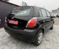 Черный Киа Рио, объемом двигателя 1.4 л и пробегом 166 тыс. км за 5999 $, фото 5 на Automoto.ua