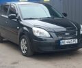 Чорний Кіа Ріо, об'ємом двигуна 1.4 л та пробігом 125 тис. км за 5900 $, фото 1 на Automoto.ua