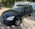 Чорний Кіа Ріо, об'ємом двигуна 1.4 л та пробігом 160 тис. км за 5494 $, фото 1 на Automoto.ua