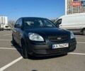 Черный Киа Рио, объемом двигателя 1.4 л и пробегом 167 тыс. км за 3500 $, фото 1 на Automoto.ua