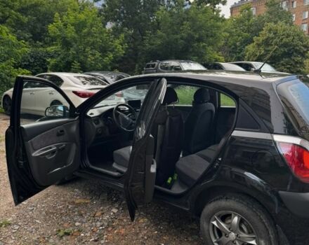 Чорний Кіа Ріо, об'ємом двигуна 1.4 л та пробігом 204 тис. км за 3888 $, фото 6 на Automoto.ua