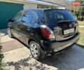 Черный Киа Рио, объемом двигателя 1.4 л и пробегом 214 тыс. км за 5100 $, фото 5 на Automoto.ua
