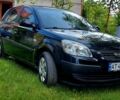 Чорний Кіа Ріо, об'ємом двигуна 1.4 л та пробігом 290 тис. км за 4600 $, фото 7 на Automoto.ua