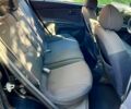 Черный Киа Рио, объемом двигателя 1.4 л и пробегом 260 тыс. км за 3900 $, фото 4 на Automoto.ua