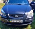 Черный Киа Рио, объемом двигателя 1.4 л и пробегом 235 тыс. км за 3300 $, фото 1 на Automoto.ua