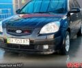 Черный Киа Рио, объемом двигателя 1.4 л и пробегом 349 тыс. км за 2599 $, фото 1 на Automoto.ua