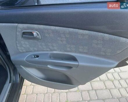 Черный Киа Рио, объемом двигателя 1.4 л и пробегом 102 тыс. км за 4499 $, фото 35 на Automoto.ua