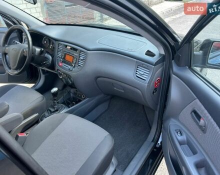 Черный Киа Рио, объемом двигателя 1.4 л и пробегом 167 тыс. км за 5200 $, фото 8 на Automoto.ua