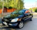 Черный Киа Рио, объемом двигателя 1.4 л и пробегом 260 тыс. км за 3900 $, фото 1 на Automoto.ua
