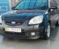 Черный Киа Рио, объемом двигателя 1.4 л и пробегом 349 тыс. км за 2599 $, фото 1 на Automoto.ua
