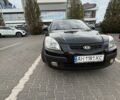 Чорний Кіа Ріо, об'ємом двигуна 1.4 л та пробігом 188 тис. км за 5100 $, фото 5 на Automoto.ua