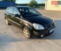 Черный Киа Рио, объемом двигателя 1.49 л и пробегом 244 тыс. км за 3500 $, фото 1 на Automoto.ua