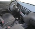 Чорний Кіа Ріо, об'ємом двигуна 1.4 л та пробігом 240 тис. км за 3711 $, фото 11 на Automoto.ua