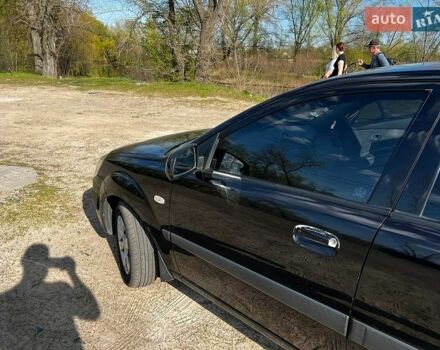 Черный Киа Рио, объемом двигателя 1.4 л и пробегом 103 тыс. км за 3400 $, фото 5 на Automoto.ua