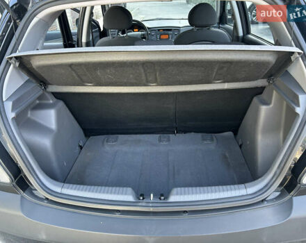 Чорний Кіа Ріо, об'ємом двигуна 1.4 л та пробігом 166 тис. км за 6100 $, фото 14 на Automoto.ua