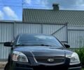 Черный Киа Рио, объемом двигателя 1.4 л и пробегом 139 тыс. км за 5000 $, фото 1 на Automoto.ua