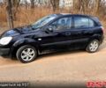 Чорний Кіа Ріо, об'ємом двигуна 1.4 л та пробігом 194 тис. км за 4500 $, фото 6 на Automoto.ua