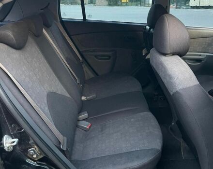 Черный Киа Рио, объемом двигателя 1.4 л и пробегом 230 тыс. км за 3850 $, фото 5 на Automoto.ua