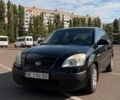 Чорний Кіа Ріо, об'ємом двигуна 1.4 л та пробігом 260 тис. км за 4600 $, фото 1 на Automoto.ua