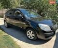 Черный Киа Рио, объемом двигателя 1.4 л и пробегом 214 тыс. км за 5100 $, фото 1 на Automoto.ua