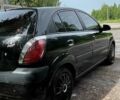 Чорний Кіа Ріо, об'ємом двигуна 1.4 л та пробігом 139 тис. км за 5000 $, фото 5 на Automoto.ua